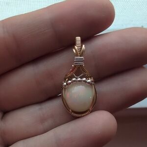 Elegant Gold and White Opal Pendant
